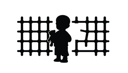 Little boy standing by broken fence with teddy bear