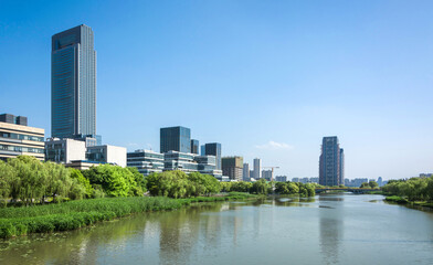 Fototapeta premium Serene Urban Landscape: A Harmonious Blend of Nature and Modern Architecture