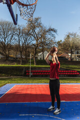 Man Playing Basketball