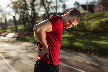 Athlete Man Having Back Pain