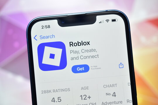 Closeup of roblox app page on smartphone screen in app store
