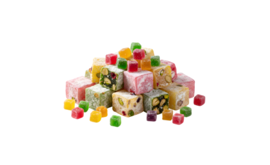 Colorful candies atop Turkish delight against a white background
