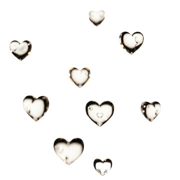 Sweet collection of twelve charming little gold-colored heart shapes, seemingly suspended in mid-air against clear backdrop. Perfect for holiday decorations or cute text messages.