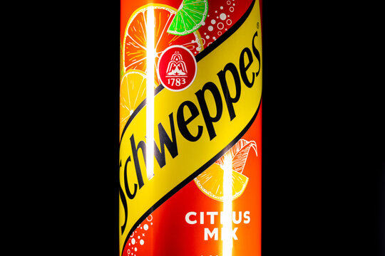 Colorful can of Schweppes Citrus Mix on a black background