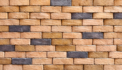 Rustic Industrial Brick Wall Texture Background Featuring Multi-Color Terracotta, Ochre, and...