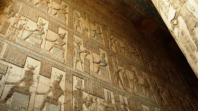 The interior of the temple in Dendera or the temple of Hathor. Ancient hieroglyphic carvings in the temple. An ancient Egyptian landmark in the vicinity of the city of Kena.