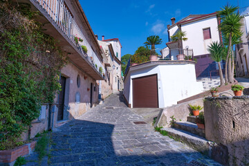 A narrow street among the old houses of Raviscanina, a small town in the province of Caserta, Italy.