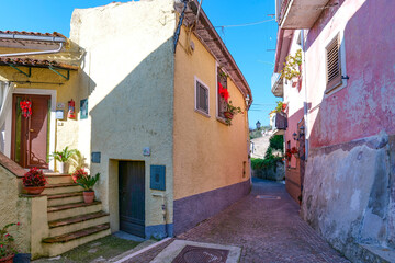 A narrow street among the old houses of Raviscanina, a small town in the province of Caserta, Italy.