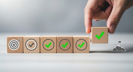 Hand placing final approval block completing quality control process