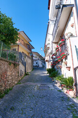 A narrow street among the old houses of Raviscanina, a small town in the province of Caserta, Italy.