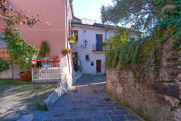 A narrow street among the old houses of Raviscanina, a small town in the province of Caserta, Italy.