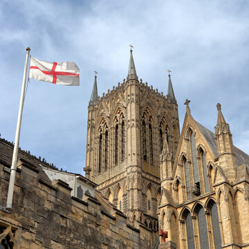 The flag of England, St. George's Cross, and Lincoln Cathedral, Lincolnshire, England UK