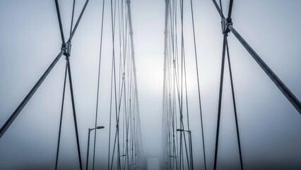Abstract View of Suspension Bridge Cables in Fog.