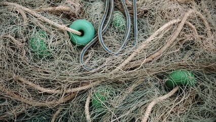 net threads with ropes and buoys as a background