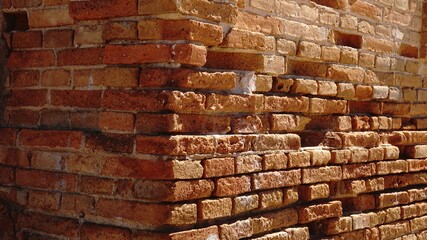 corner of red brick wall