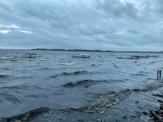 Minimal seascape with yellow boat