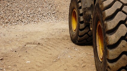 Excavator big tires on ground