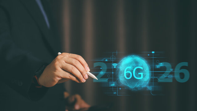 Businessman using pen touching 6G high speed internet connection concept. Global wireless network, future technology 2026, digital communication, and telecommunication innovation background. - Powered by Adobe