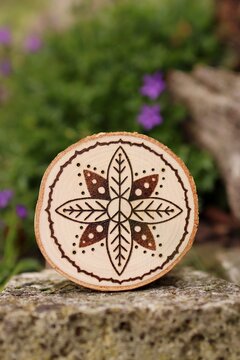 Mandala hand-burned into wood - pyrography