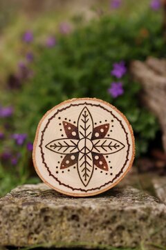 Mandala hand-burned into wood - pyrography
