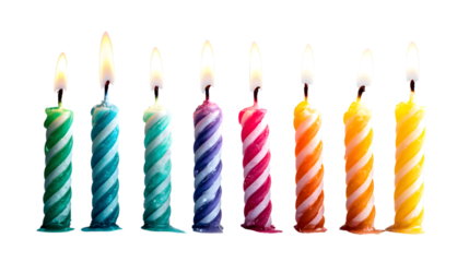 Colorful birthday candles lit up isolated on white background