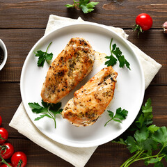 Homemade roasted chicken breast on plate