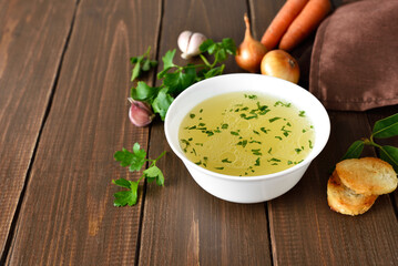 Chicken broth in bowl