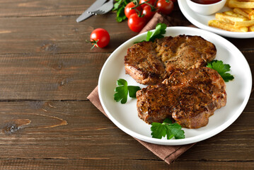 Juicy grilled pork steaks