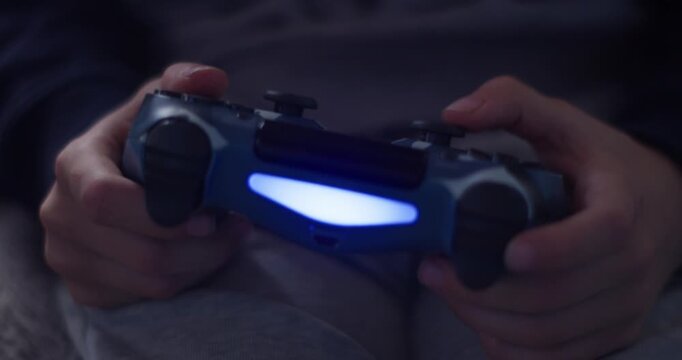 Game Controller in the Hands of a 7-Year-Old Child &ndash; Close-Up