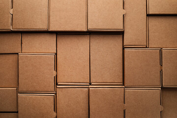 Cardboard boxes pattern from craft paper top view. Eco delivery, zero waste, plastic free package concept.