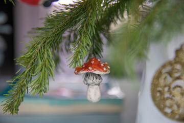 Spruce branches decorated with New Year and Christmas decorations