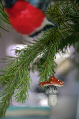 Spruce branches decorated with New Year and Christmas decorations