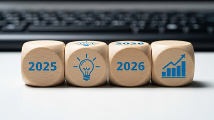 Business planning for 2025 and 2026 with wooden blocks