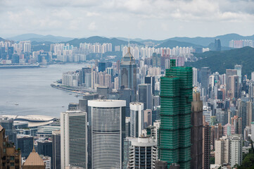 View of Hong Kong and Kowloon from Victoria peak. Panorama of Hong Kong, skyscrapers and nature.