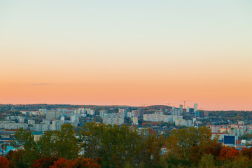 Fototapeta premium rustic post USSR Eastern Europe aerial panorama outskirts living city scape building in dusk lighting evening