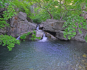 Hasanboguldu Lake and Suteven Waterfall in Balikesir, Turkey are the most touristic places in the region. © sinandogan