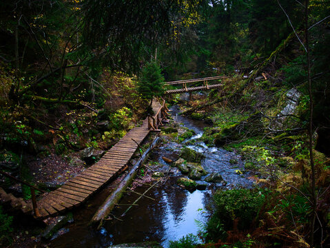Bridge over river Opava with stones in Jeseniky mountains