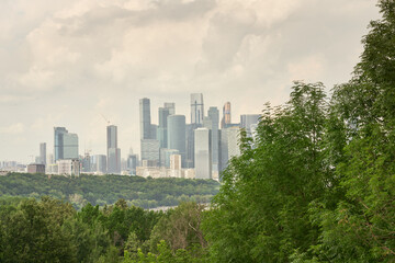 Fototapeta premium View of the skyscrapers of the Moscow city from the park