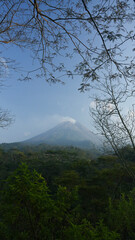TIWGS WITH BACKGROUND MT MERAPI IN YOGYAKARTA CITY INDONESIA