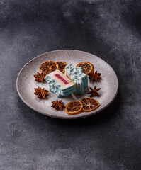 Christmas mochi, mooncake, or cheesecake shaped like a snowflake. Christmas mochi or cheesecake