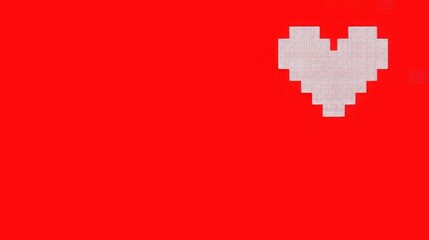 Obraz premium A solid red background features a white 8-bit pixelated heart shape positioned near the top right border.