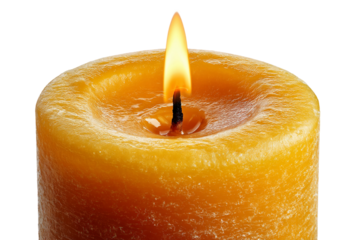 Soft glowing candle flame close up isolated on transparent background
