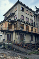 Facade of abandoned hospital building