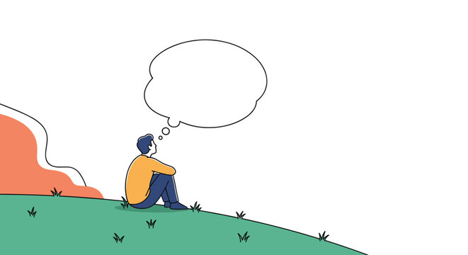 Young man sitting alone on a grassy hill looking up at a blank thought bubble, contemplating, dreaming, or thinking of an idea.