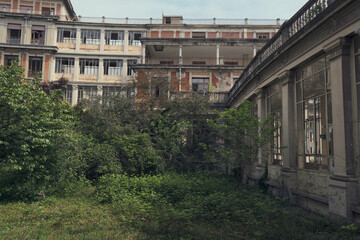 Facade of abandoned hospital building