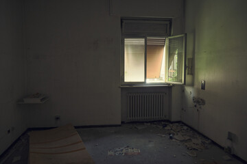 Facade of abandoned hospital building