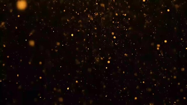 Abstract Golden Particles Drifting Dynamically on Dark Background, Creating a Shimmering Dust Effect for Festive Overlays and Atmospheric Visuals