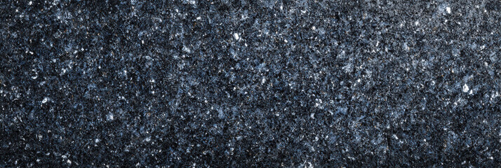 Dark blue asphalt texture surface showing abstract nature detail on rough road pavement for grunge wallpaper and urban background design concepts