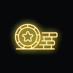 Obraz premium Yellow neon sign of a casino chip rolling into a brick wall on a black background