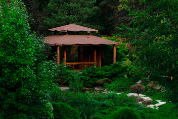 Asian wood land aesthetic landscape greenery foliage environment space with gazebo wooden landmark camp summer day